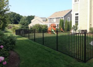Read more about the article Aluminum vs. Wood Fences: Which is Better for Your Home?